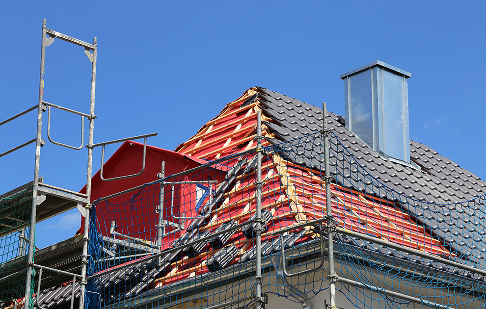 Roof repairs in  South West London